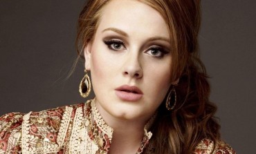 Adele announces new album with single release.