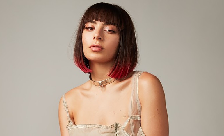 Charli XCX Announces Title of New Single: “claws”.