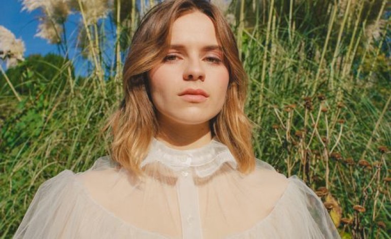 Gabrielle Aplin Reschedules Tour and Sells Unused Merchandise to Fans