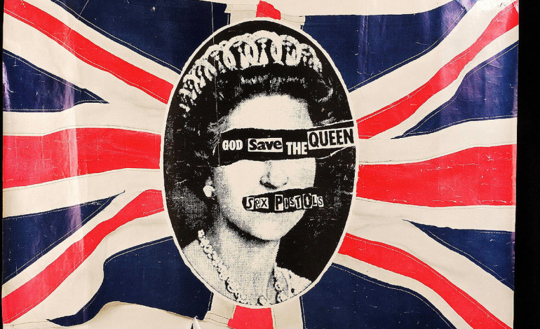 Glen Matlock Of Sex Pistols Perform An Updated Version Of ‘God Save The Queen’