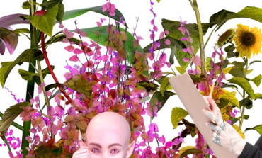 Grimes Unveils New ‘Alien Scars’ Back Tattoo