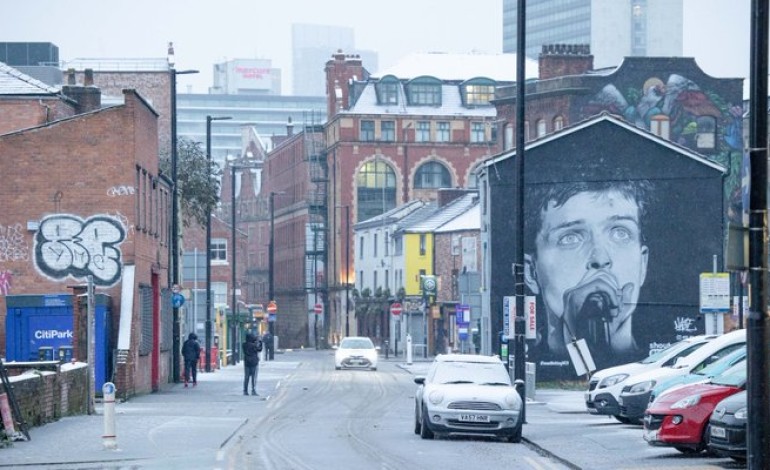 Ian Curtis Mural To Return To Manchester After Being Replaced By An Aitch Album Ad